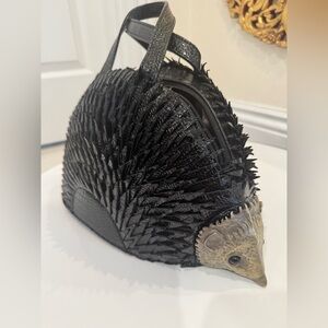 Black and gold Hedgehog/porcupine purse/handbag.‎ Brand new with tags.
